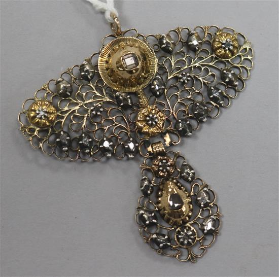 A Hispanic rose diamond set silver and gold pendant, 5cm.